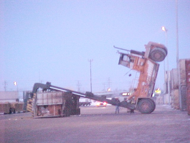 Forklift pulled over by the weight of its load