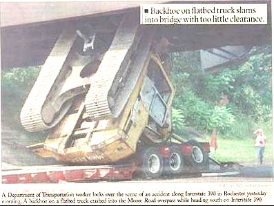 Excavator which nearly fit under a bridge